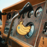 AIR FRESHNER À LA BANANE, SUN BUM
